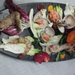 Pesce crudo fresco