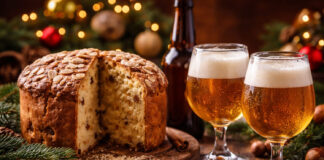 Birra e panettone a Natale: abbinamenti perfetti Birra e panettone a Natale serviti insieme per un abbinamento originale tra dessert natalizio e birra artigianale, in un contesto elegante e festivo.
