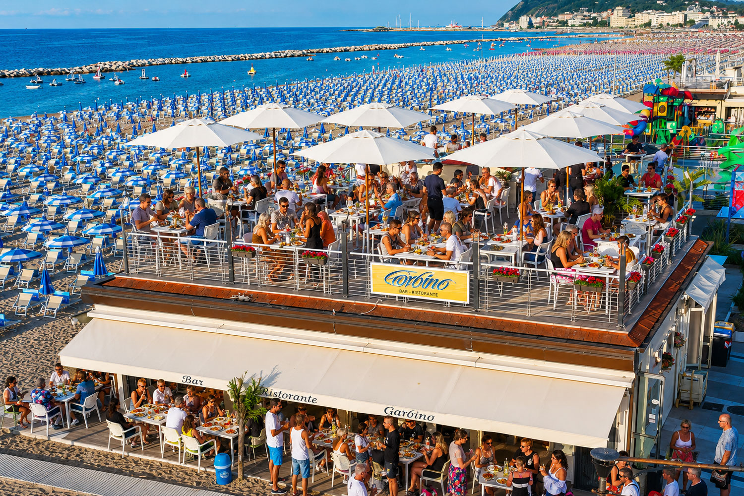Garbino a Cattolica con terrazza vista mare, aperitivi in spiaggia, piatti di pesce e cocktail ad Altamarea Beach Village