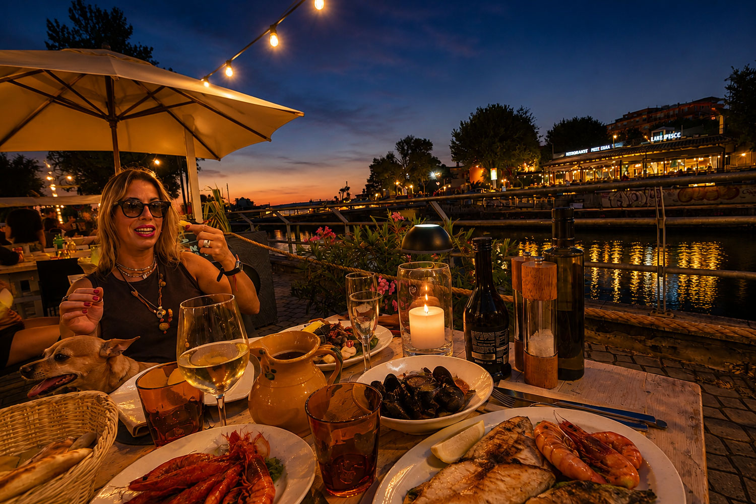 Pesce e pizza a Cattolica sulla terrazza sul canale del ristorante La Puracia